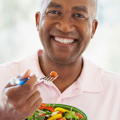Man eating with dentures