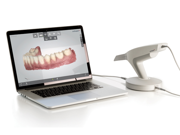 Computer with denture scanner attached