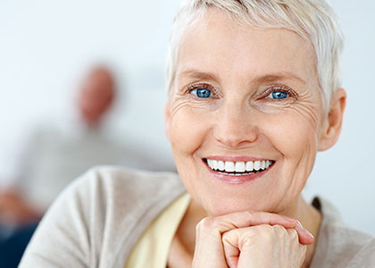 Woman smiling with partial dentures